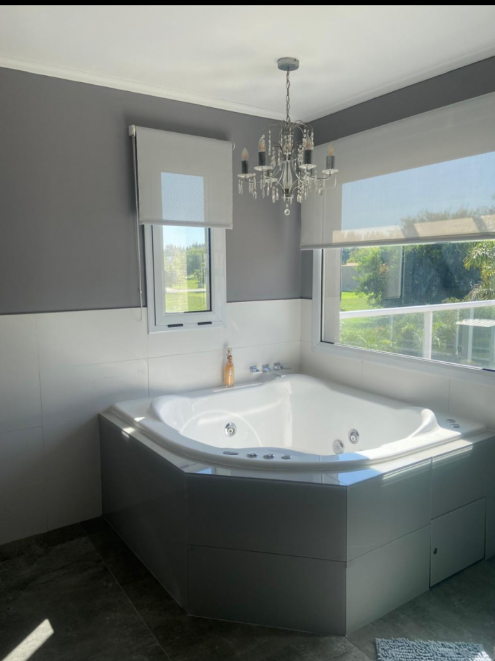 MAJESTUOSA RESIDENCIA DE 5 AMBIENTES EN VENTA EN EL CLUB DE CAMPO LA RESERVA ESCONDIDA - AREA 60
